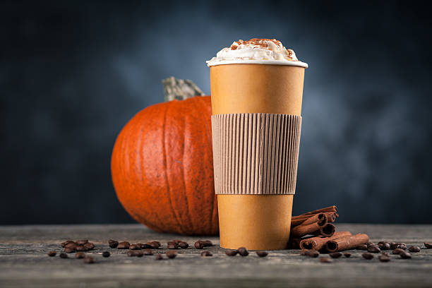 istock Pumpkin spice latte in a paper cup 619634582