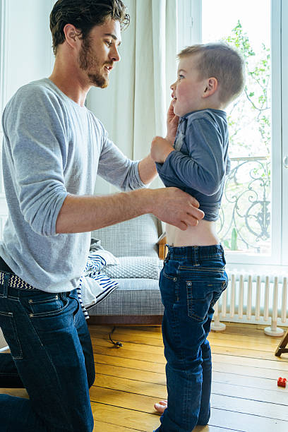 istock Father And Son Getting Ready In The Morning 619634632