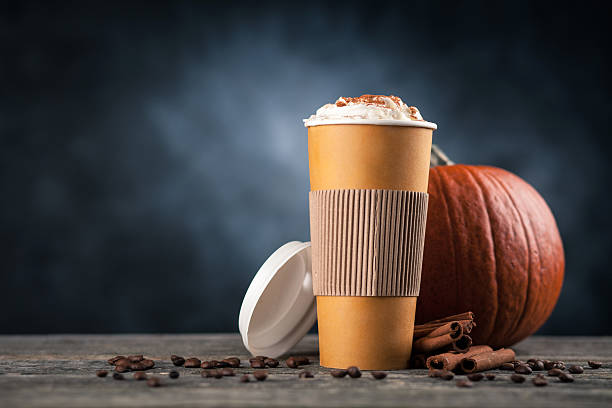 istock Pumpkin spice latte in a paper cup 619634634