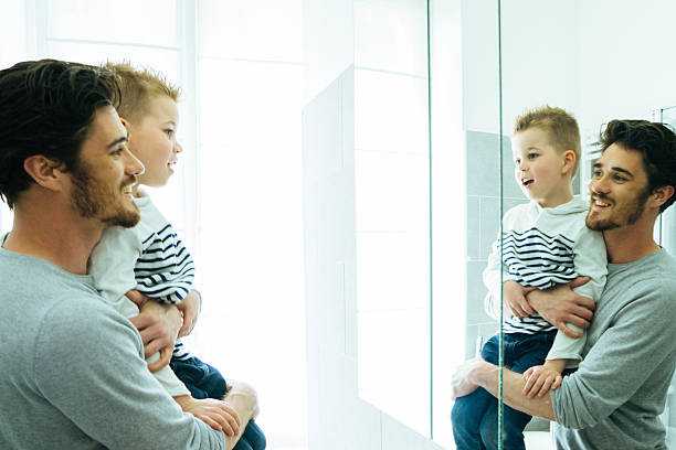 istock Father And Son Getting Ready In The Morning 619634878