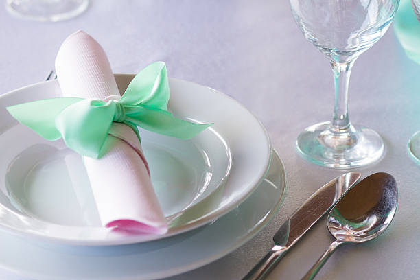 istock wedding chairs with ribbon 619636060