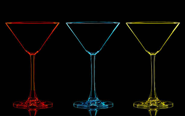 Silhouette of color martini glass on black