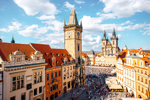 Historic house and high spires tower in old town Prague, Czech Republic