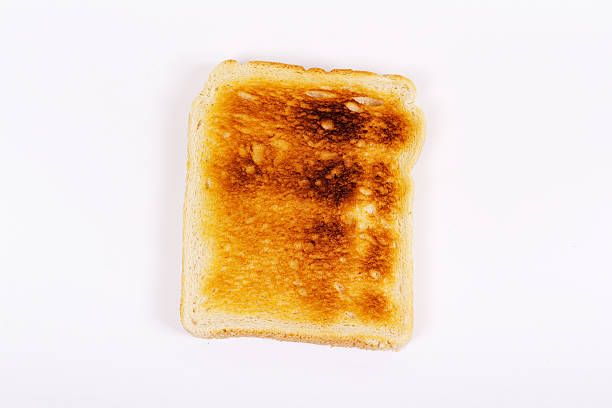istock Slice of toast on a white background 619640136