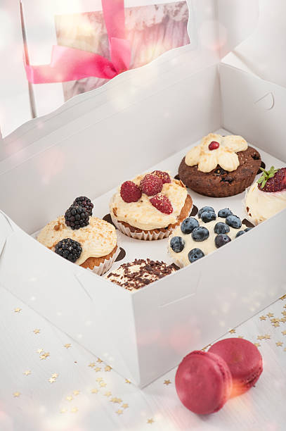 istock Blueberry delicious cupcakes in a paper box 619640854