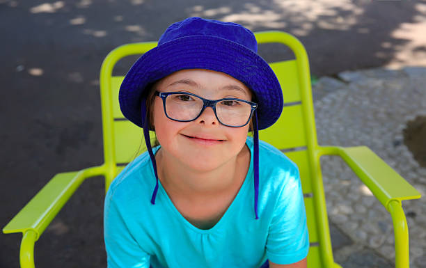 Little girl smiling outside