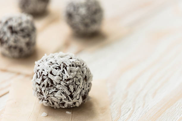 Sweet energy bites with cocoa and walnuts