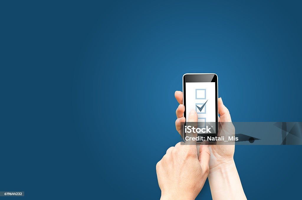 Checkboxes on phone screen Questionnaire Stock Photo