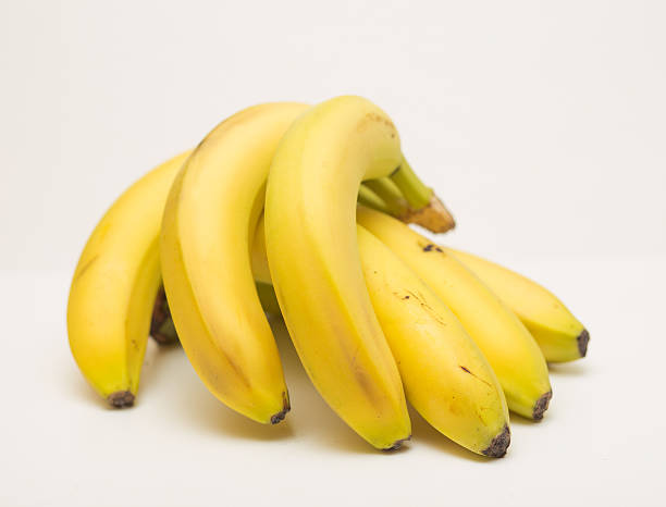 istock Bunch of bananas isolated on white background 619646906