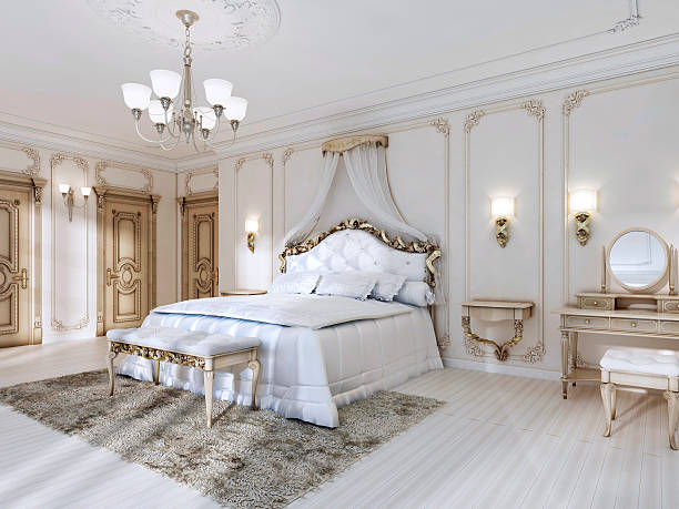 istock Luxurious bedroom in white colors in a classic style. 619648262