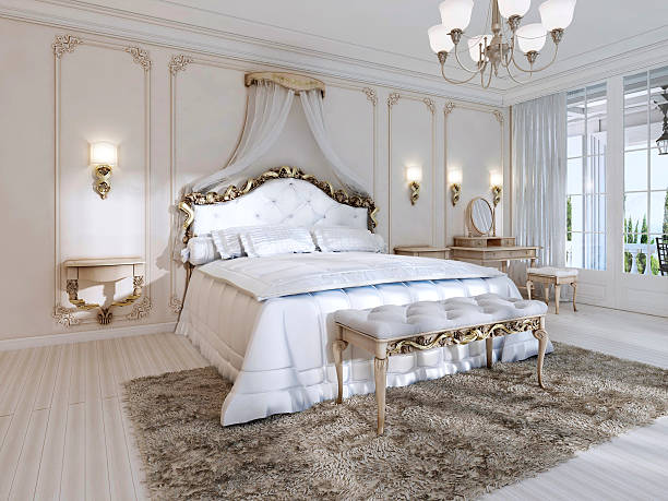istock Luxurious bedroom in white colors in a classic style. 619648606