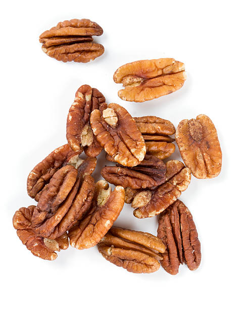 pecan nuts over white stock photo