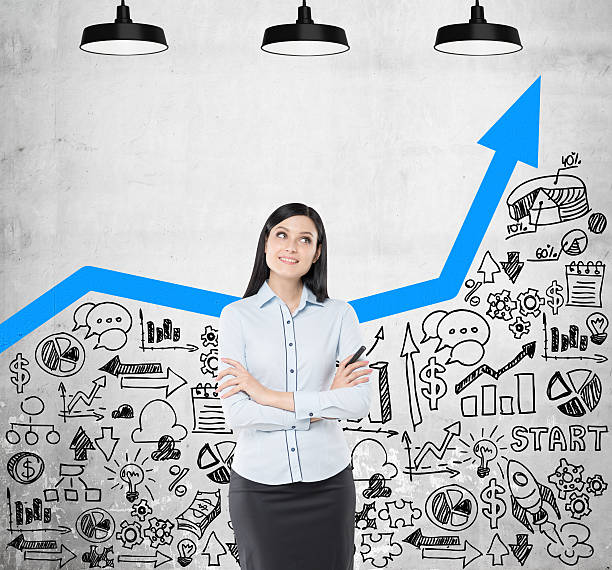 istock Dreamy girl with blue graph on concrete wall 619651412