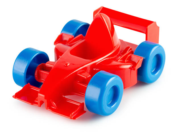 red plastic toy car isolated on the white background