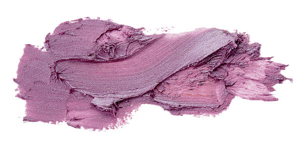 istock Smudged purple lipstick isolated on white background 619653470