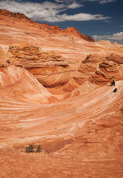 istock Couple relax at the Wave in American Southwest 619656404