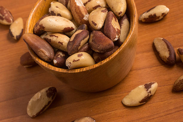istock Brazilian Nuts into a bowl. Para Chestnut 619657514