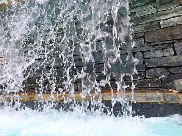 istock Waterfall Spashing and Falling Closeup Detail Image 619657626