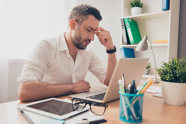 istock Tired ponder man thinking about way to complete task 619659428