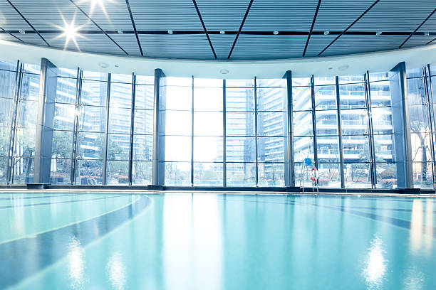 istock bright indoors swimming pool 619660602
