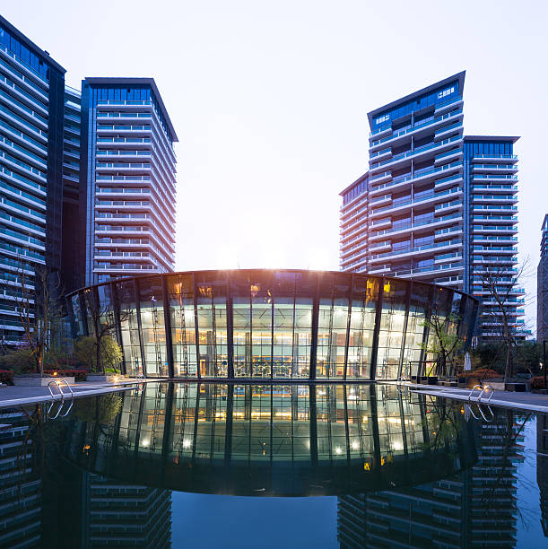 istock modern office buildings with sunbeam in hangzhou 619661086