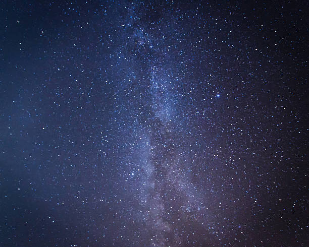 istock Milky way galaxy with stars and space dust 619661138