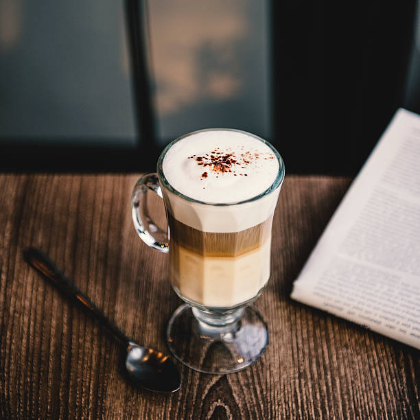 istock Coffee Shop Cafe Latte Cappuccino Newspaper Concept 619662594
