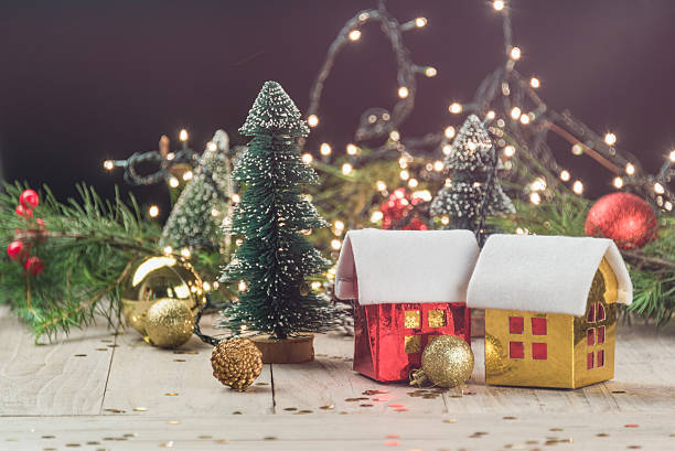 istock christmas decorations with baubles,tree and toy house 619662886