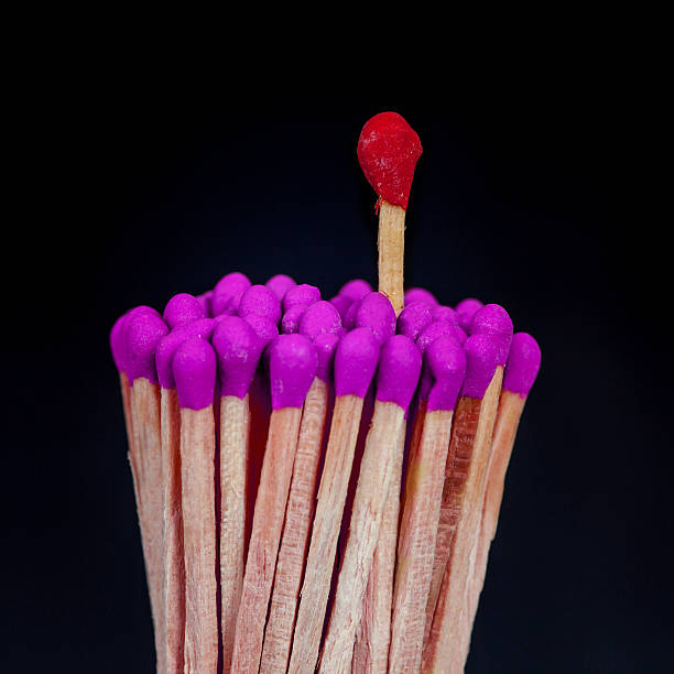 istock One matchstick standing over from the group, leader concept 619664312