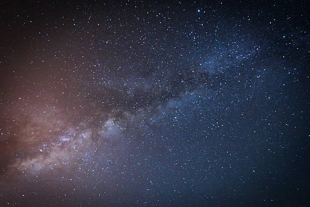 istock Milky way galaxy with stars and space dust 619664840
