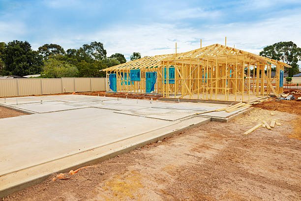 preparação do local de construção - foundation block - fotografias e filmes do acervo