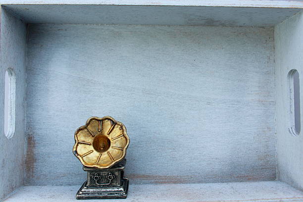 istock Vintage gramophone ornament in white wooden box 619667052