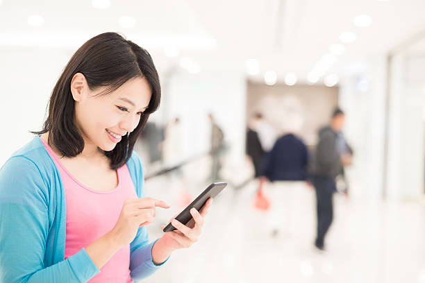 istock Happy woman shopping 619667776