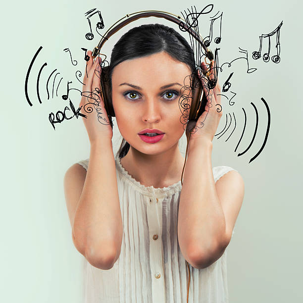 istock Girl with headphones 619667880