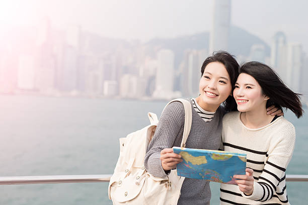 istock two woman look somewhere 619668442