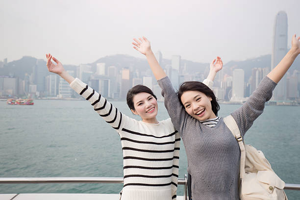 istock two woman feel free and travel 619668720