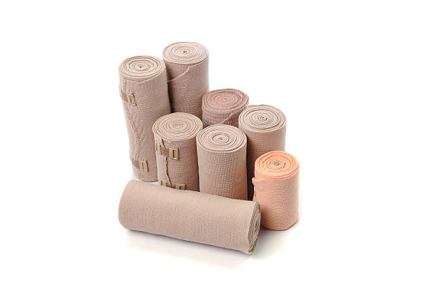 istock Medical bandage roll isolated on white background 619668870
