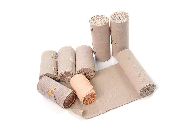 istock Medical bandage roll isolated on white background 619668896