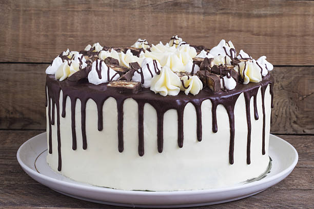 istock Round homemade cake with a meringue and chocolate 619669324