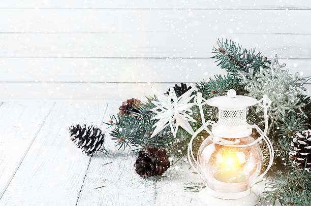istock Christmas latern on a white wooden background 619669668