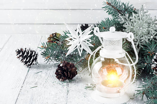 istock Christmas latern on a white wooden background 619669688
