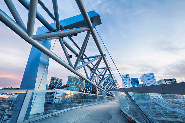 современные здания в осло, норвегия - bridge crossing cloud built structure стоковые фото и изображения