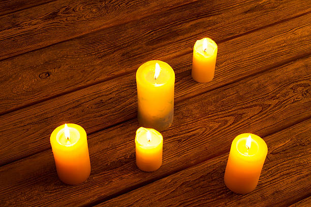 istock Golden light of candle flame. 619675598