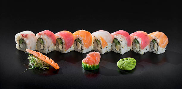 istock Fresh Uramaki sushi rolls. Mix colorful sushi 619675762
