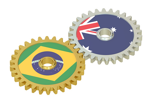 Brazil and Australia flags on a gears, 3D rendering isolated on white background