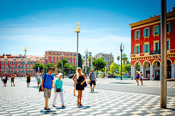 turisti in place massena nice, francia - city of nice france massena city foto e immagini stock