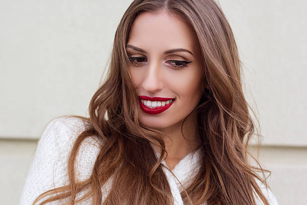 istock Pretty woman with perfect smile 619732610