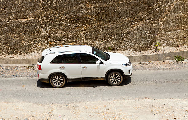 Hoabinh, Vietnam - Jun 3, 2014: Kia New Sorento car is running on the mountain road in test drive, Vietnam.