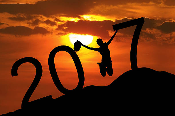 istock Woman jumping on the hill and 2017 619735824