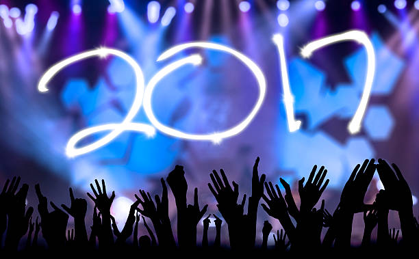 Silhouette hands people with number 2017
